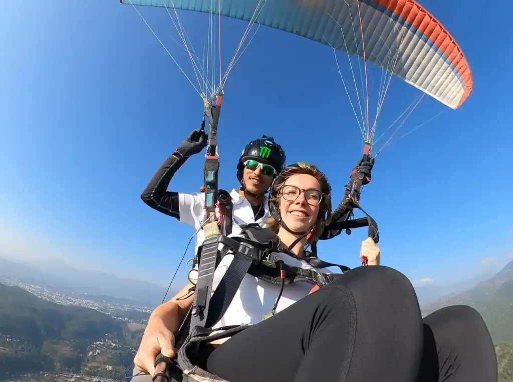 Paragliding over the scenic landscapes of Rishikesh, India